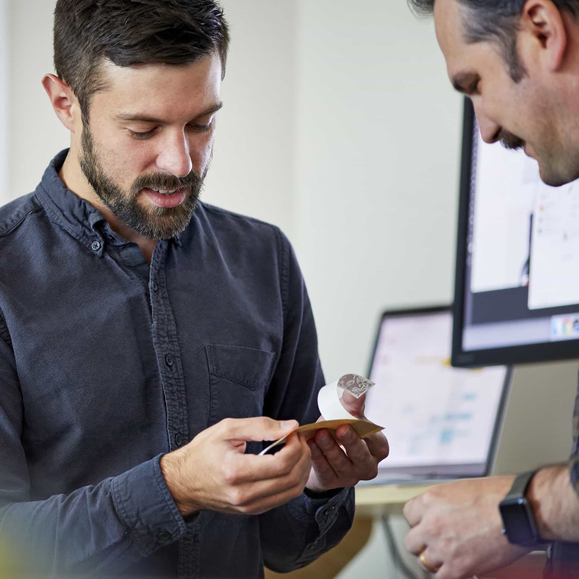 ad-lpm-cpg-expert-support-men-reviewing-materials-thumbnail