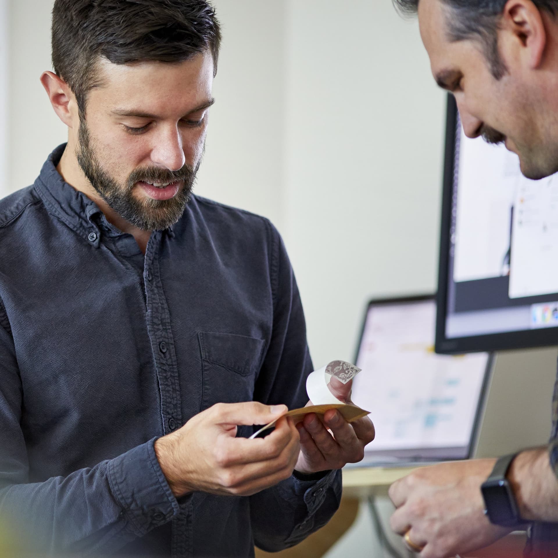 ad-lpm-cpg-expert-support-men-reviewing-materials-thumbnail