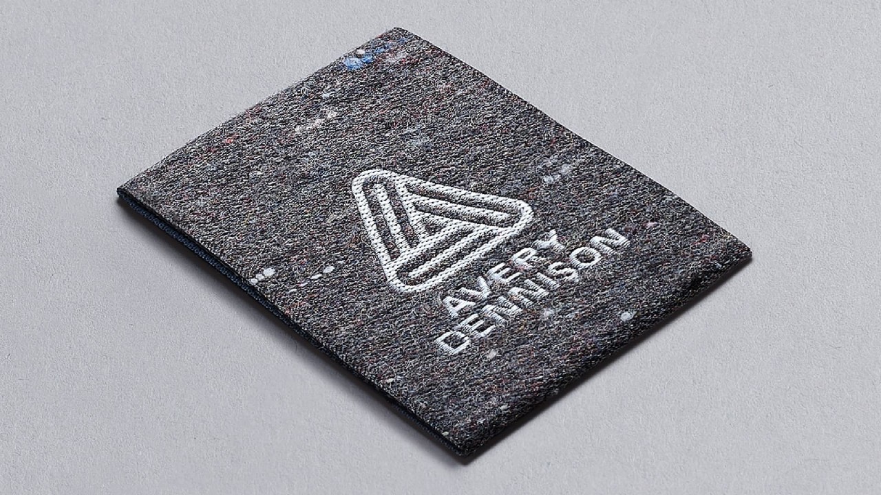 woven apparel tag made from recycled materials with Avery Dennison logo, Albert yarn