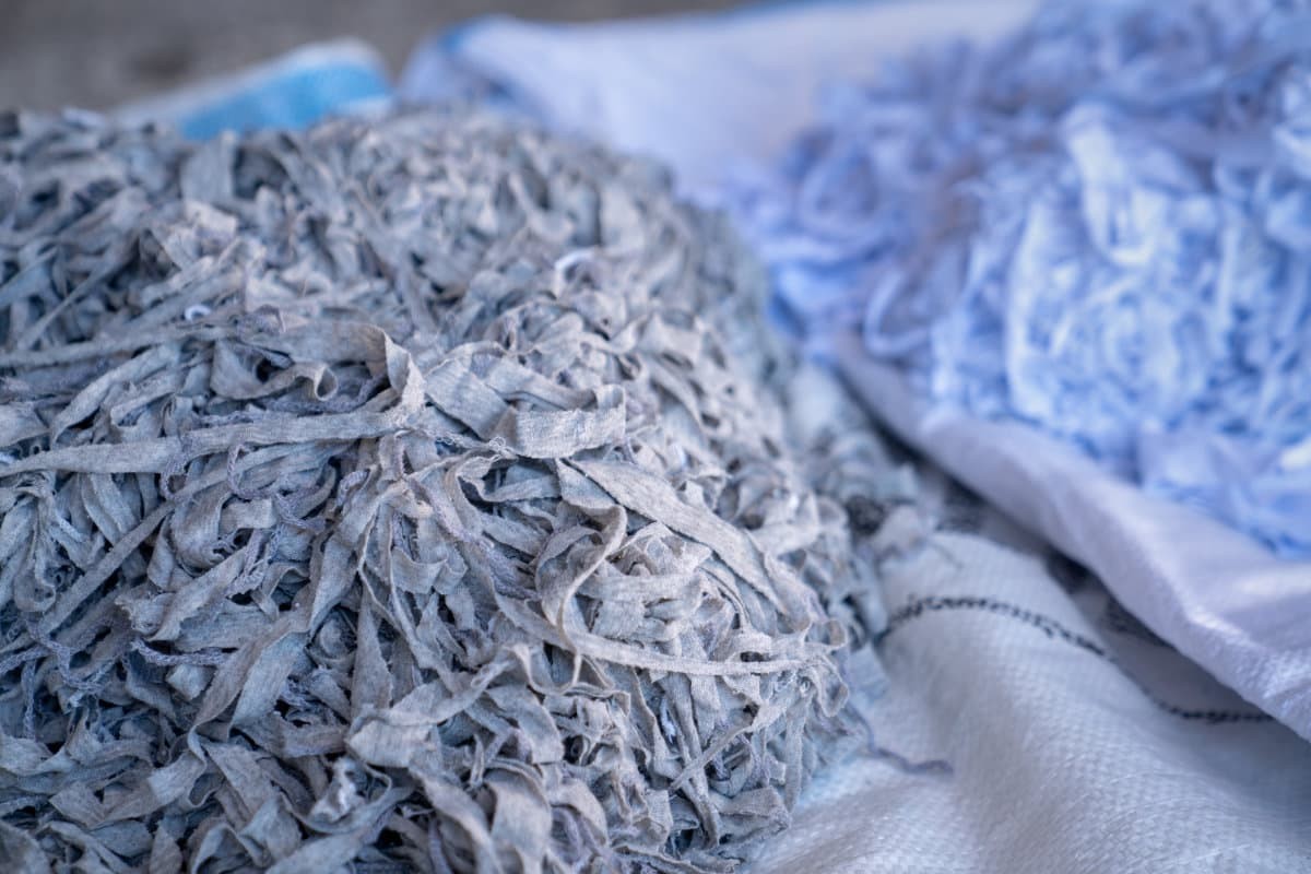 Recyled textile fabrics in a pile.